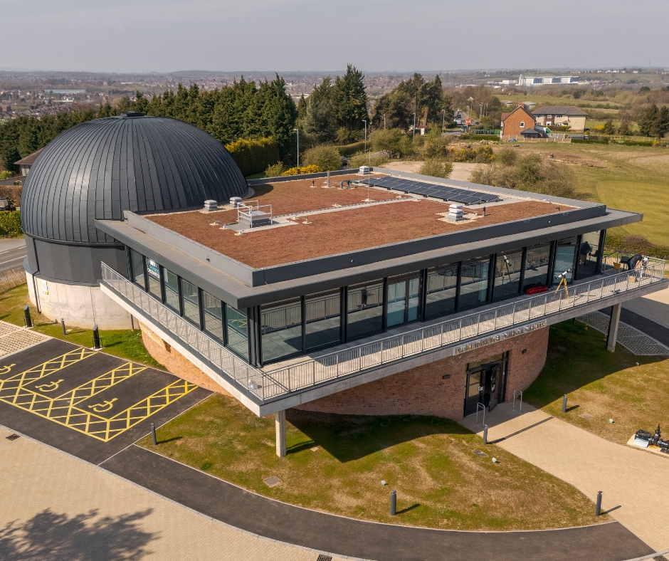 An aerial view of Sherwood Observatory’s planetarium dome and Science Centre building